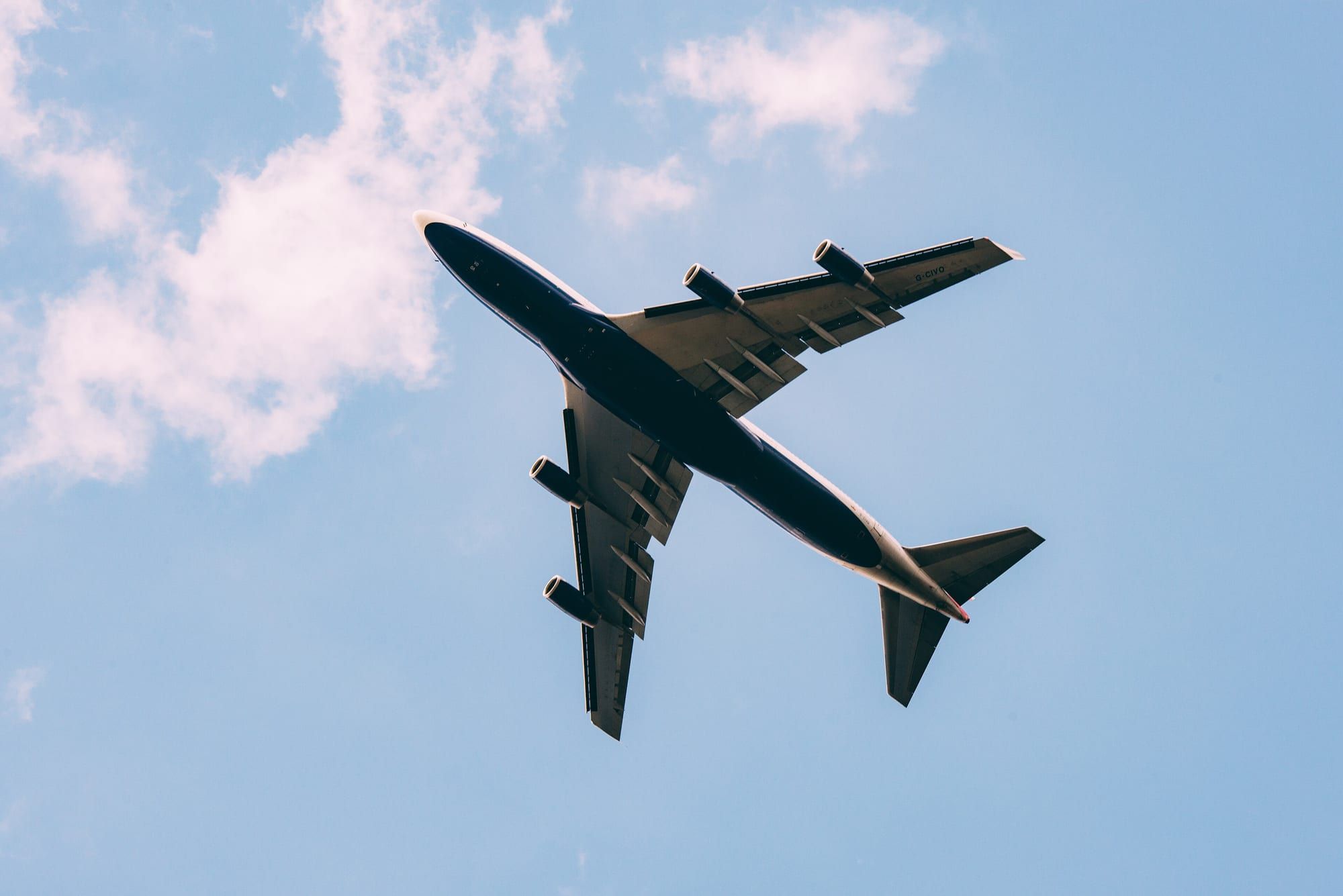 A passenger airliner in flight seen from below
